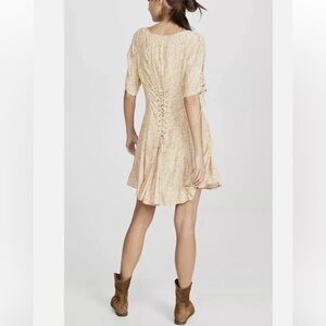 Free People boho chic floral lace up mini dress